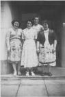 Factory workers standing outside Kayser Bonder....