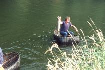 Coracle fishermen with salmon 1984