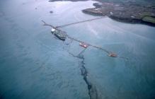 Aerial view of the Sea Empress tanker leaking oil