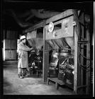 Man filling bags at Pantyffynnon Colliery