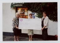 Merched y Wawr Pontarddulais Branch accepting a...