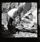 Quarryman preparing a large section of rock