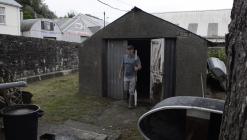 Malcolm Rees with paddle, Towyside Coracle Shed...