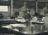 Worker on factory floor, Rheola Works, Glyn...