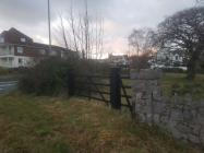 Gates & gate posts at former entrance to...