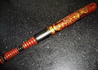 Decorated truncheon.