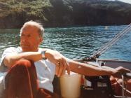 Peter Sturdgess at the helm of his Sailfish, Fly