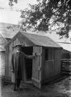 Arthur Artie Moore outside his amateur radio...