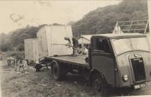 Containers being loaded at Algin Construction,...