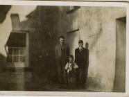 Three children with cat, Plas Farm, Eglwyswen