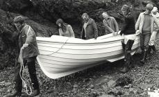 Launching the rowing boat, Skomer Island c.1980s