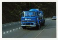 Blue milk tanker with LLAETH  marking on front,...