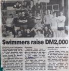 Newspaper cutting of RRW charity Triathlon team...